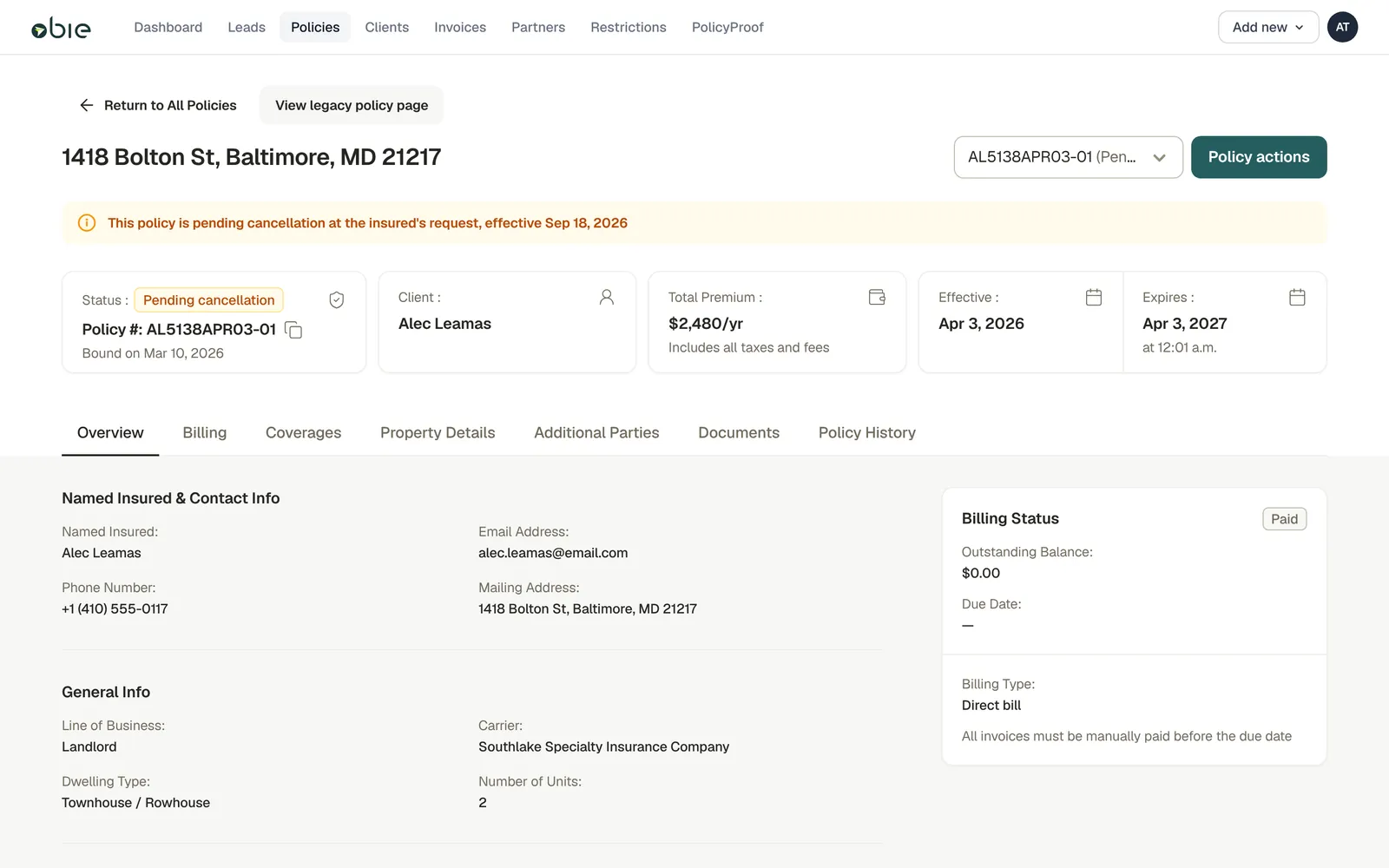 The redesigned policy page: a banner reading 'This policy is pending cancellation at the insured's request, effective Sep 18, 2026', four fact cards, a tab bar, and a billing card on a grey ground.